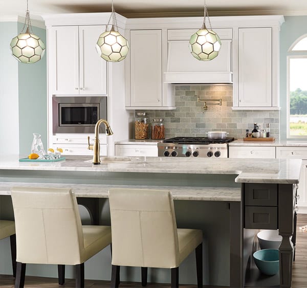 A kitchen setting with unique pendant lighting