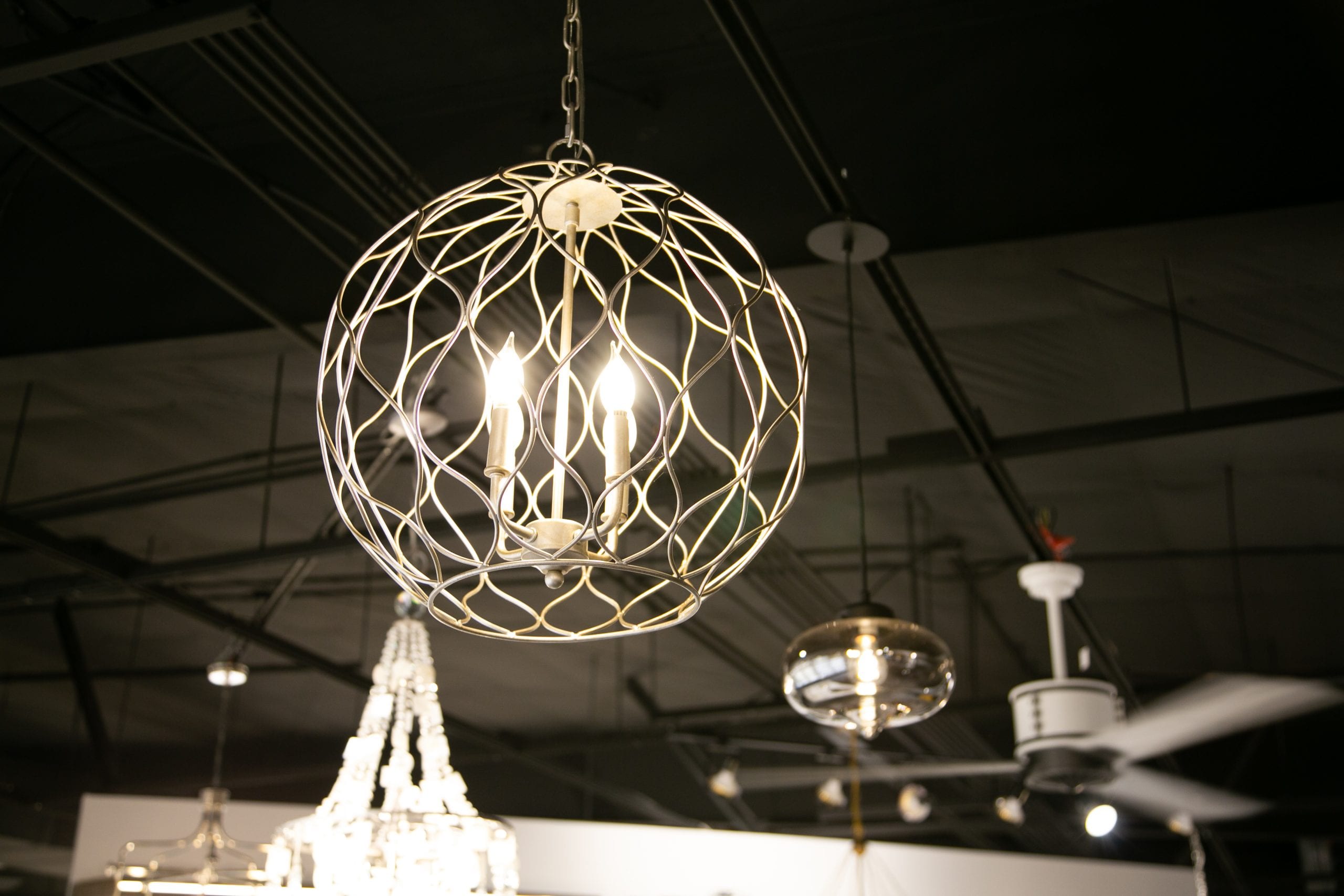 Beautiful farmhouse lighting example in facets of lafayette showroom.